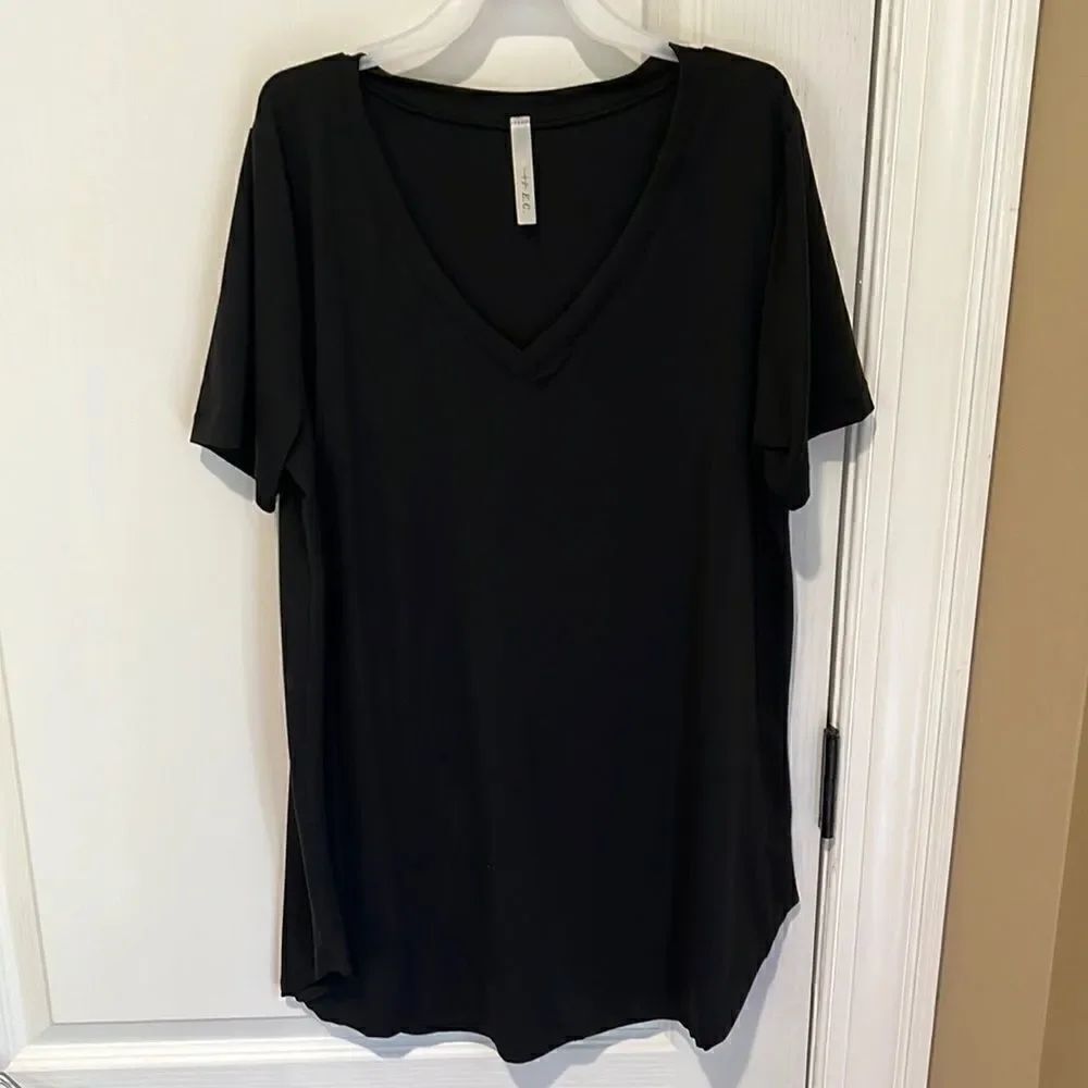 New E.C. Super soft black shirt sleeve top